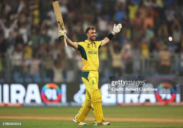 Glenn Maxwell of Australia celebrates after hitting a six for the winning runs, finishing unbeten on 201 not out during the ICC Men's Cricket World...