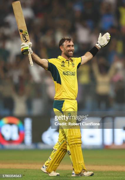 Glenn Maxwell of Australia celebrates after hitting a six for the winning runs, finishing unbeaten on 201 not out during the ICC Men's Cricket World...