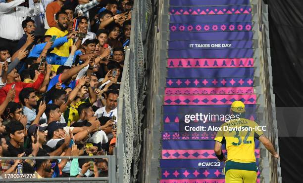 Glenn Maxwell of Australia makes their way back to the changing rooms after scoring 201 not out following the ICC Men's Cricket World Cup India 2023...