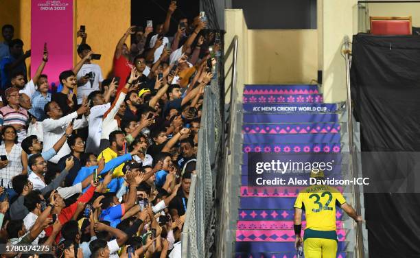 Glenn Maxwell of Australia makes their way back to the changing rooms after scoring 201 not out following the ICC Men's Cricket World Cup India 2023...