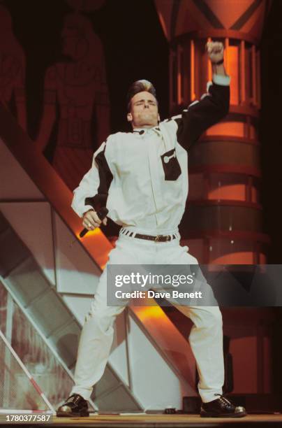 American rapper Vanilla Ice performs on stage at the Smash Hits Poll Winners Party, Docklands Arena, London, January 11th 1990.