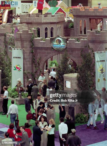 Video gamers walk among many displays and vendors at the Electronic Entertainment Expo , May 16, 1996 in Los Angeles, California.