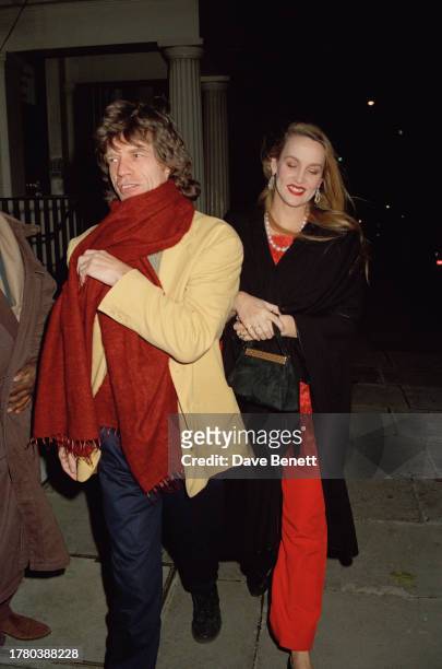 English singer Mick Jagger with American model Jerry Hall in London, 19th November 1991.