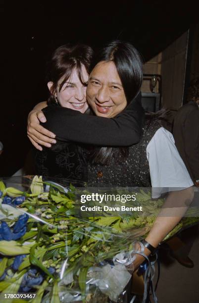 Chinese-Irish designer John Rocha and Odette Gleeson at London Fashion Week, London, 18th October 1993.