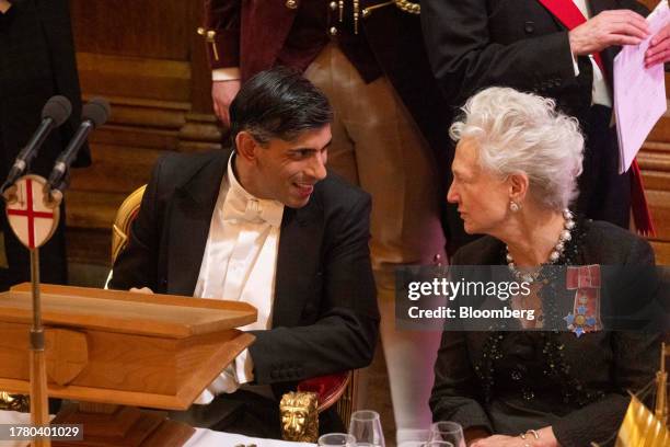 Rishi Sunak, UK prime minister, speaks to Clara Furse, former chief executive officer of London Stock Exchange, at the Lord Mayor's Banquet at the...