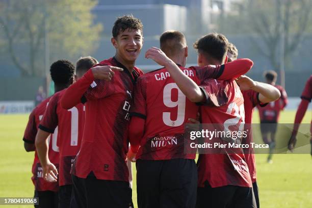 Francesco Camarda of AC Milan U19 celebrates his first goal with his teammates during the match of Group F - UEFA Youth League 2023/24 between AC...