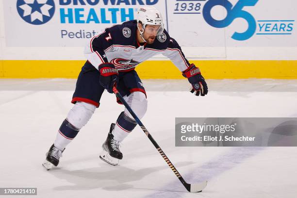 Sean Kuraly of the Columbus Blue Jackets skates with the puck against the Florida Panthers at the Amerant Bank Arena on November 6, 2023 in Sunrise,...