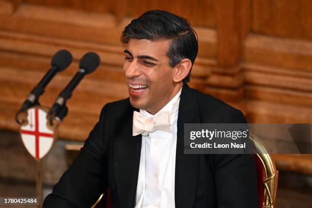 Prime Minister Rishi Sunak laughs during a speech at the Lord Mayor's Banquet at Guildhall on November 13, 2023 in London, England. Over 600 guests,...