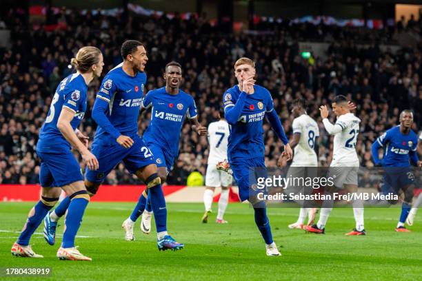 Cole Palmer of Chelsea FC celebrate with Levi Colwill and Conor Gallagher after scoring a goal during the Premier League match between Tottenham...