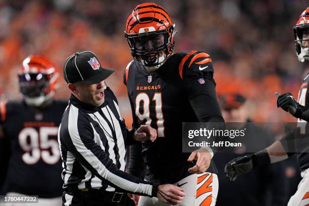 Defensive end Trey Hendrickson of the Cincinnati Bengals speaks with an official during a NFL football game against the Buffalo Bills at Paycor...