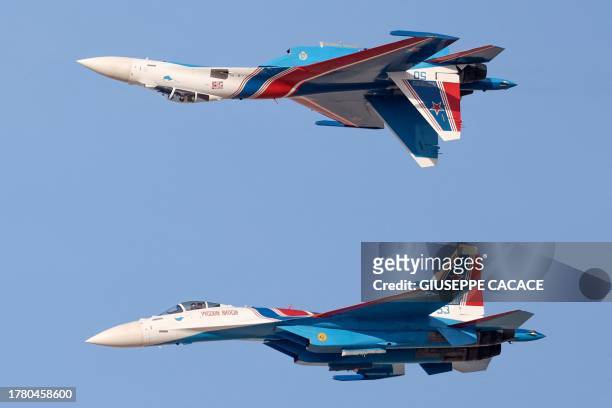 Russian Air Force aerobatic team the 'Russian Knights' perform during the 2023 Dubai Airshow at Dubai World Central - Al-Maktoum International...