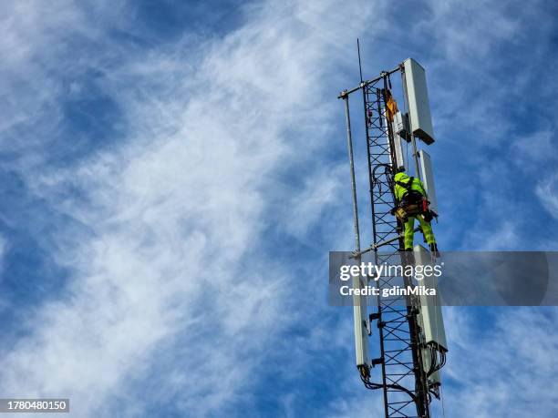 mobile 5g installation on high mast - telecommunications equipment stock pictures, royalty-free photos & images