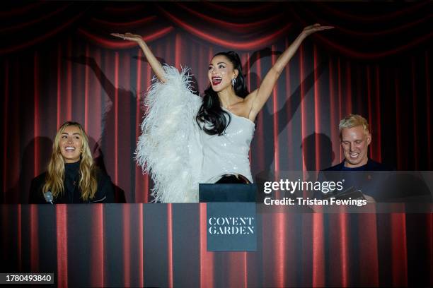 Nicole Scherzinger switches on the Christmas lights during the official 2023 Covent Garden Christmas lights launch on November 07, 2023 in London,...