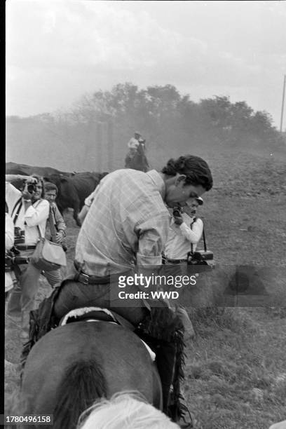Prince Charles of Wales visits a cattle ranch, owned by Tobin and Anne Armstrong, in Houston, Texas, on October 21, 1977.