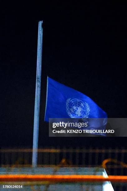 The UN flag flies at half-mast at the United Nations headquarters in Jerusalem on November 13, 2023. Flags flew at half-mast at United Nations...