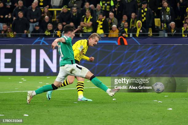 Julian Brandt of Borussia Dortmund scores the team's second goal during the UEFA Champions League match between Borussia Dortmund and Newcastle...