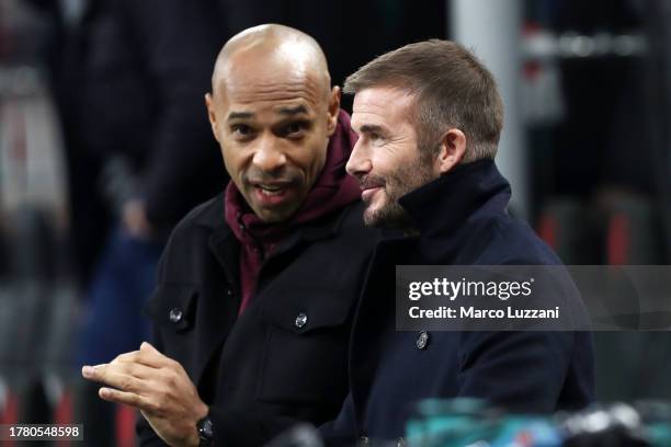 David Beckham looks on alongside Thierry Henry prior to the UEFA Champions League match between AC Milan and Paris Saint-Germain at Stadio Giuseppe...