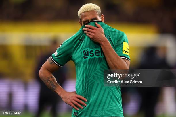 Joelinton of Newcastle United looks dejected following the team's defeat during the UEFA Champions League match between Borussia Dortmund and...