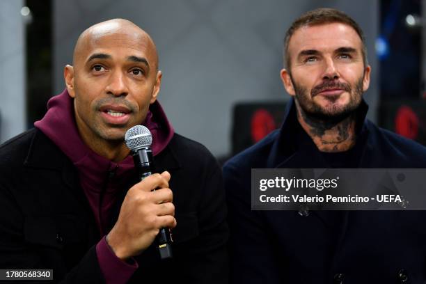 Thierry Henry and David Beckham look on prior to the UEFA Champions League match between AC Milan and Paris Saint-Germain at Stadio Giuseppe Meazza...