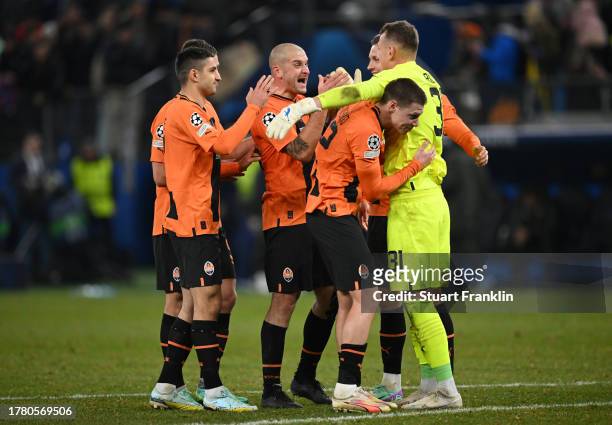 Players of FC Shakhtar Donetsk celebrate after the team's victory during the UEFA Champions League match between FC Shakhtar Donetsk and FC Barcelona...