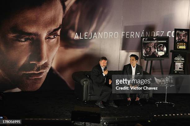 Chairman/CEO, Universal Music Latin American and Iberian Peninsula Jesus Lopez and Alejandro Fernandez speak during a press conference to promote the...