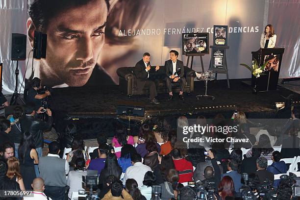 Chairman/CEO, Universal Music Latin American and Iberian Peninsula Jesus Lopez and Alejandro Fernandez speak during a press conference to promote the...