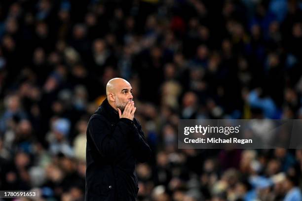 Pep Guardiola, Manager of Manchester City, looks on during the UEFA Champions League match between Manchester City and BSC Young Boys at Etihad...