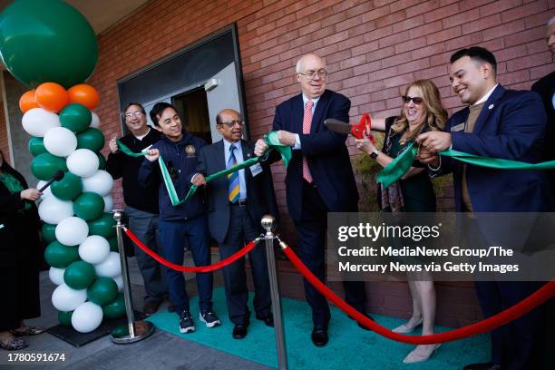 Oct. 27: Metropolitan Education District Superintendent Alyssa Lynch, second from right, cuts a ribbon during an opening ceremony event of the...