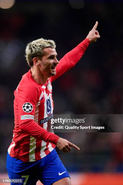 Antoine Griezmann of Atletico Madrid celebrates after scoring his team first goal during the UEFA Champions League match between Atletico Madrid and...