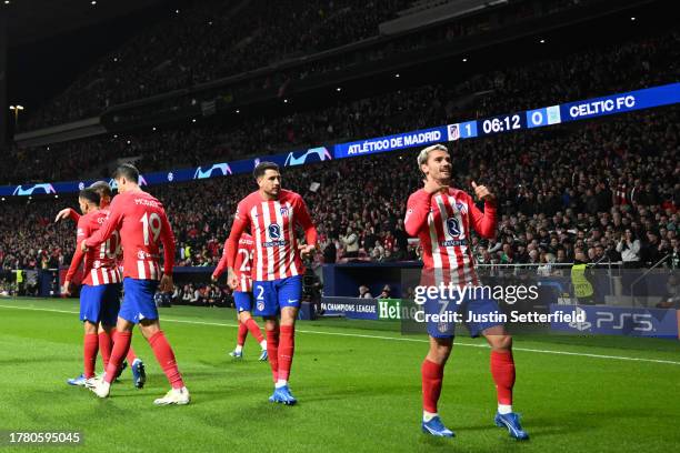 Antoine Griezmann of Atletico Madrid celebrates after scoring the team's first goal during the UEFA Champions League match between Atletico Madrid...