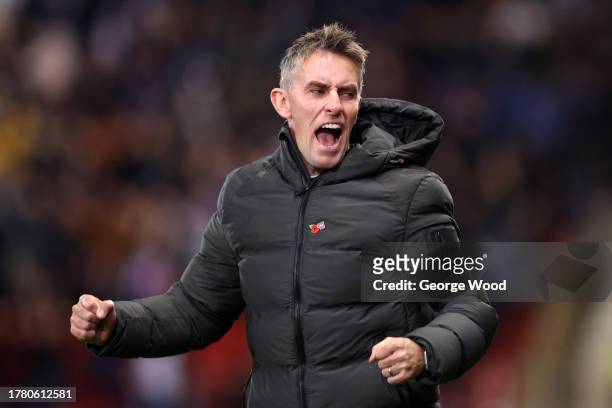Kieran McKenna, Manager of Ipswich Town, celebrates after the team's first goal during the Sky Bet Championship match between Rotherham United and...