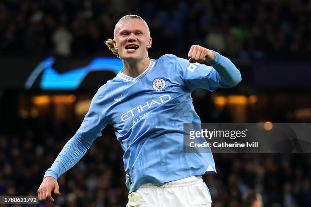 Erling Haaland of Manchester City celebrates after scoring the team's first goal from the penalty spot during the UEFA Champions League match between...