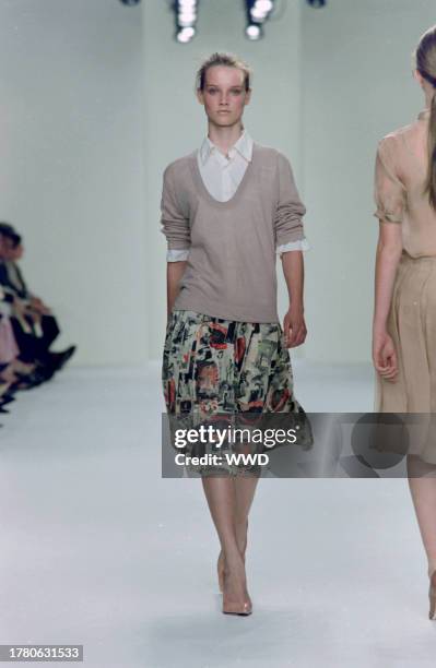 This is the first collection designed by Francisco Costa following Calvin Klein's departure from his eponymous label in the fall of 2003. Model...