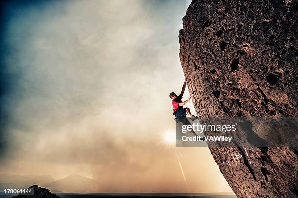 strength - free climbing stock pictures, royalty-free photos & images