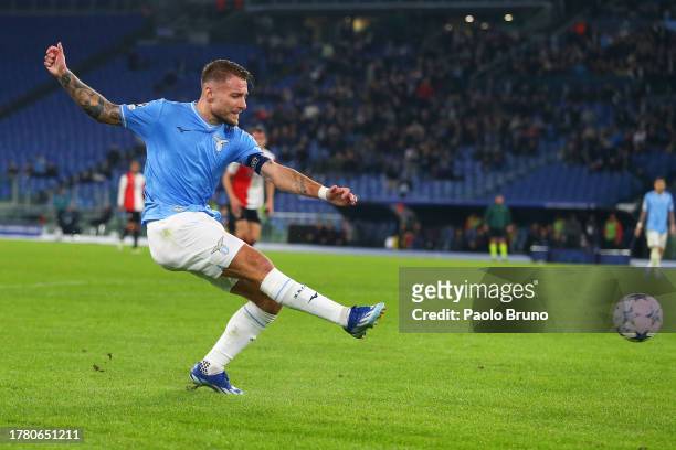 Ciro Immobile of SS Lazio scores the team's first goal during the UEFA Champions League match between SS Lazio and Feyenoord at Stadio Olimpico on...