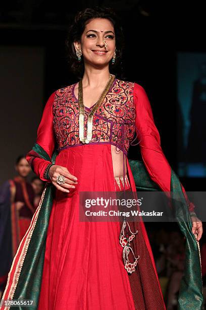 Juhi Chawla showcases designs by Shruti Sancheti during day 4 of Lakme Fashion Week Winter/Festive 2013 at the Hotel Grand Hyatt on August 26, 2013...