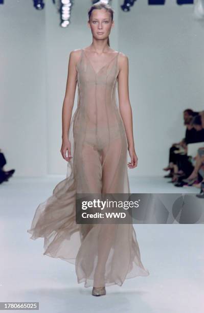 This is the first collection designed by Francisco Costa following Calvin Klein's departure from his eponymous label in the fall of 2003. Model Tiiu...