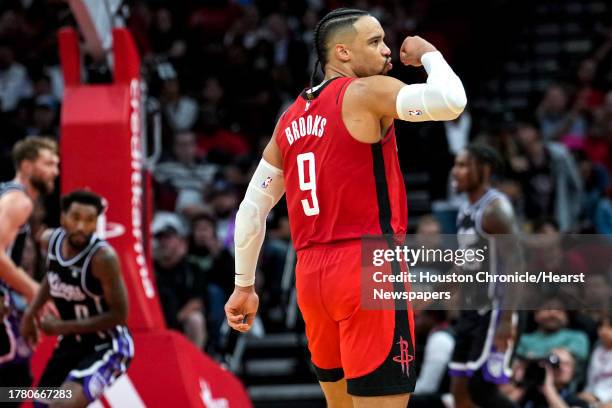 Houston Rockets forward Dillon Brooks reacts after hitting a 3-pointer abasing the Sacramento Kings during the second half on an NBA basketball game...