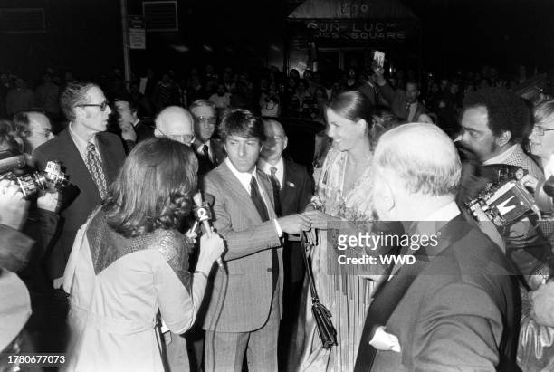 Dustin Hoffman and Anne Byrne attend the New York premiere of "All the President's Men" at the Loews Astor Plaza cinema, followed by an afterparty at...