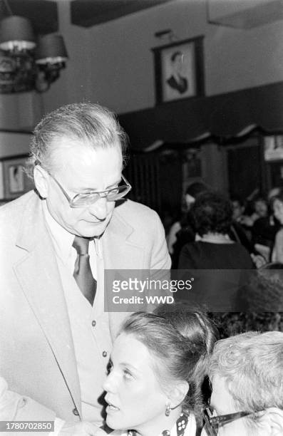 George C. Scott and Trish Van Devere attend an awards ceremony at Sardi's in New York City on January 30, 1977.
