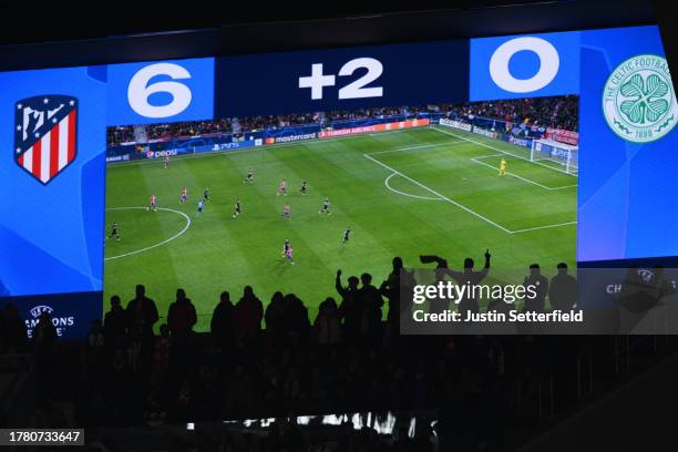 The LED board shows the score as 6-0 with two minutes of additional time during the UEFA Champions League match between Atletico Madrid and Celtic FC...