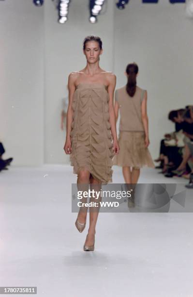 This is the first collection designed by Francisco Costa following Calvin Klein's departure from his eponymous label in the fall of 2003. Model Diana...