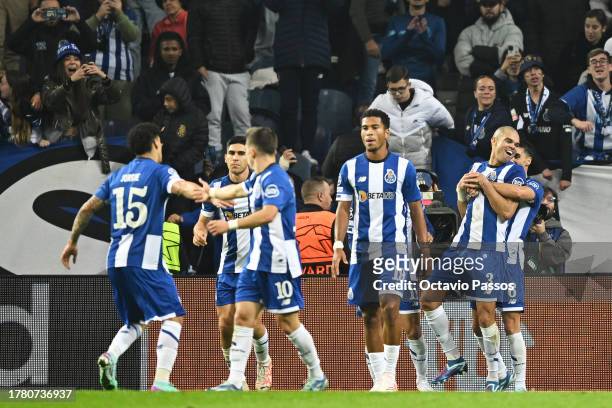 Pepe of FC Porto celebrates with teammates after scoring the team's second goal during the UEFA Champions League match between FC Porto and Royal...