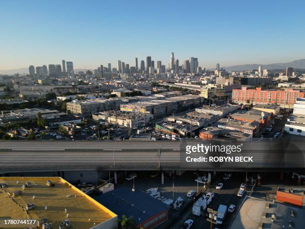 An aerial picture taken on November 13, 2023 shows the I-10 freeway after a large fire led to the shutdown of the freeway, also called the Santa...