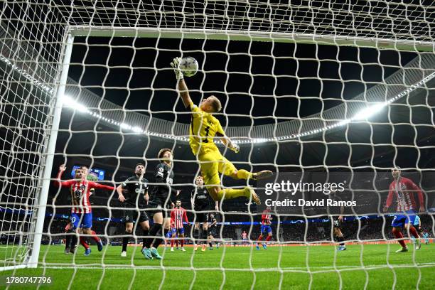 Joe Hart of Celtic makes a save during the UEFA Champions League match between Atletico Madrid and Celtic FC at Civitas Metropolitano Stadium on...