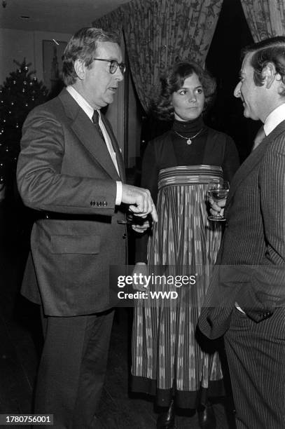 John Chancellor, Mary Chancellor, and John Schmuacher attend a party, celebrating the release of Charlotte Curtis' book "The Rich and Other...