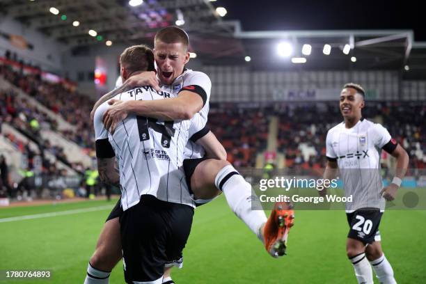 Jack Taylor of Ipswich Town celebrates with teammate Harry Clarke after scoring the team's second goal during the Sky Bet Championship match between...