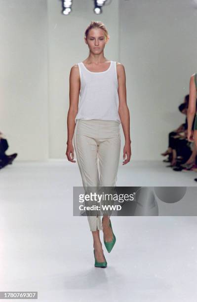 This is the first collection designed by Francisco Costa following Calvin Klein's departure from his eponymous label in the fall of 2003. Model Sara...