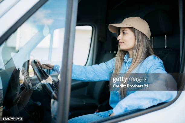 Delivery Rider Behind Lorry 28 Delivery Driver Behind Wheel Stock Photos, High-Res Pictures, and ...