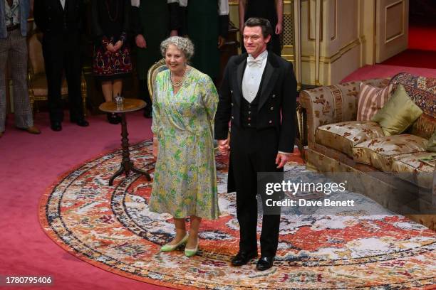 Dame Penelope Wilton and Luke Evans bow at the curtain call during the press night performance of "Backstairs Billy" at The Duke Of York’s Theatre on...